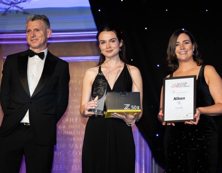 Falmouth University student, Anna Roth collecting her award at the UK Picture Editors Guild Award Ceremony