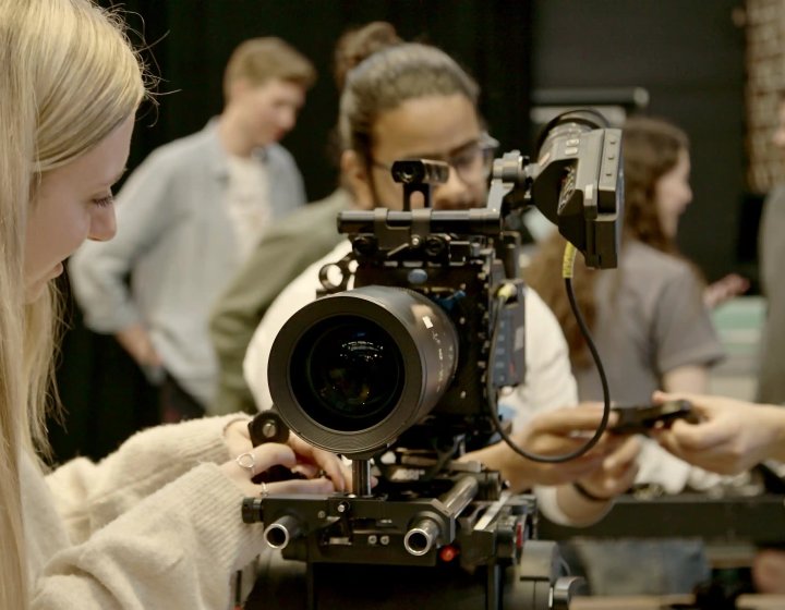 People using an ARRI camera as part of a demonstration