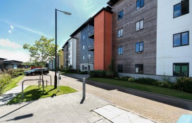 A block of student accommodation with a lamp