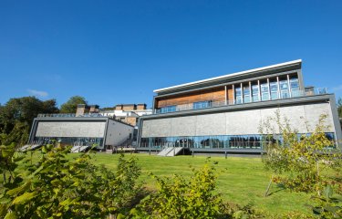 The AMATA Arts Centre building on a sunny day