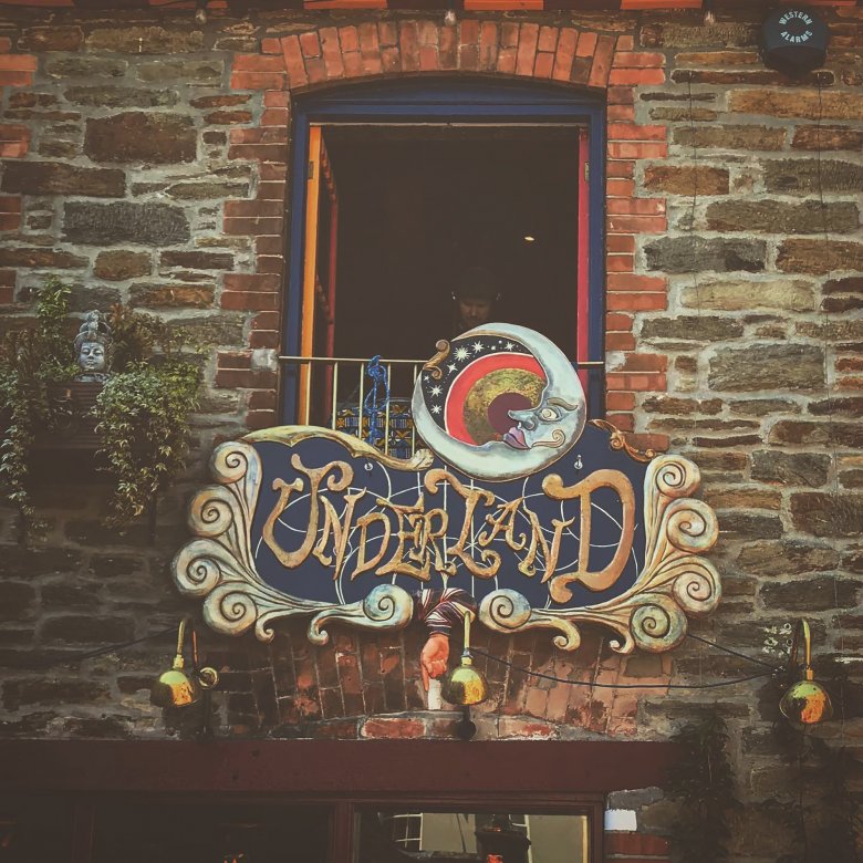 The circus-inspired sign hanging over bar and venue Underland in Falmouth