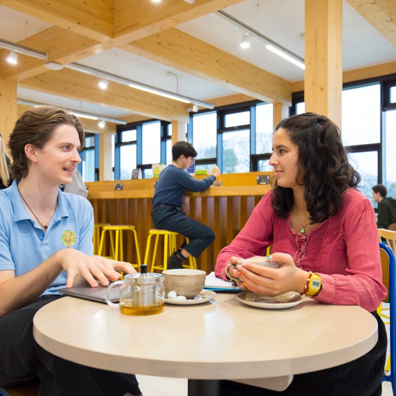 Students chat in the sustainability cafe