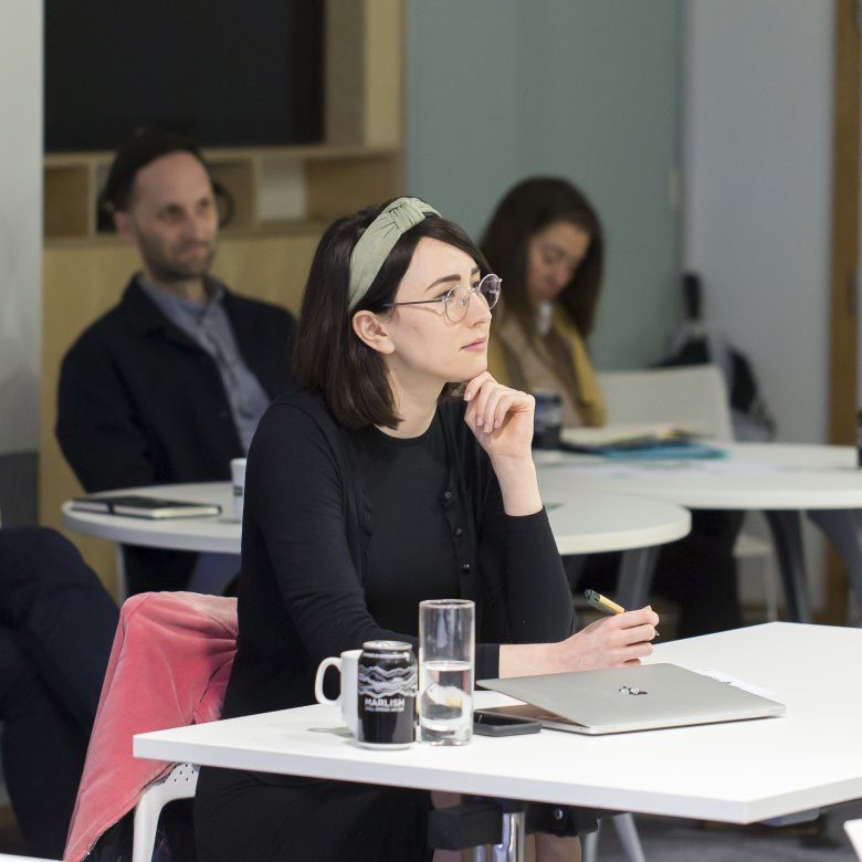 Student Anna Calandra sat in a meeting