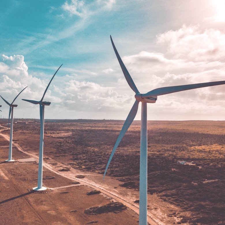 Brown landscape with a link of windmills