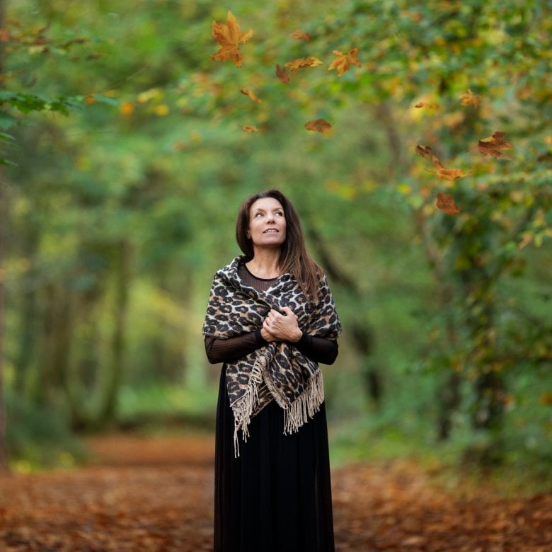 A woman stood in a forest