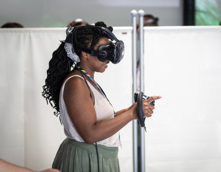 A woman wearing a VR headset