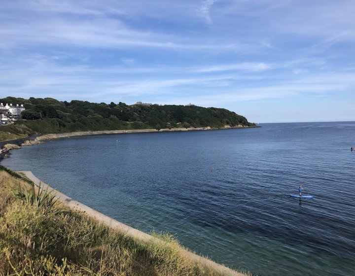 View of Castle Beach in Falmouth with Pendennis Castle in the background