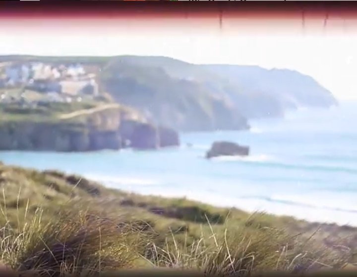 Still from graduate's student life video showing view over Cornish cliffs to the sea.