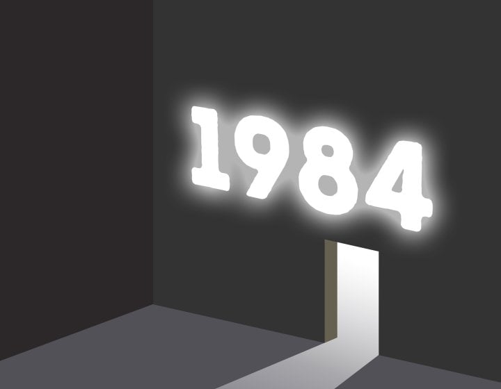 A black and white image of a wall with the white door frame in with the text '1984' above the door in glowing white light