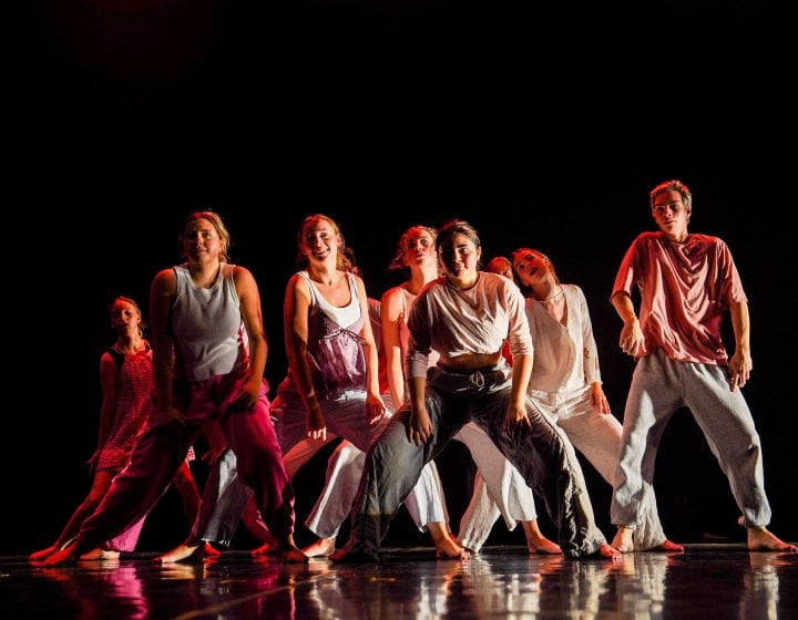 A group of young dancers performing on stage