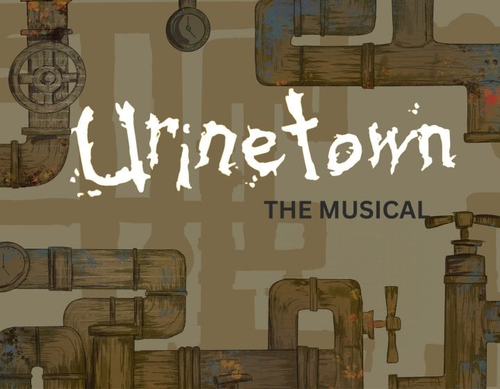 An illustrative image with brown and dark towns of pipework with the text 'Urinetown The Musical' in the centre