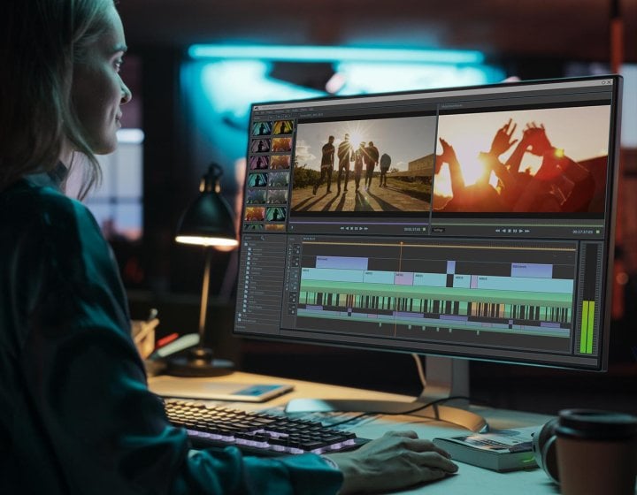 A woman using video editing software