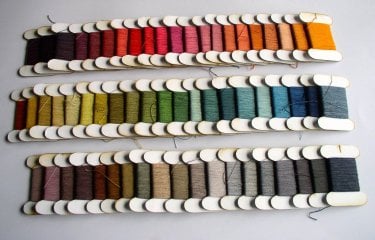 Large selection of different coloured yarns