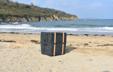 WoolBox Cooler (designed by Falmouth University graduate) on a beach