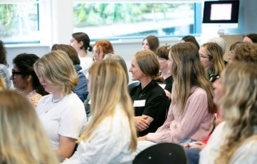 A group of people at a lecture