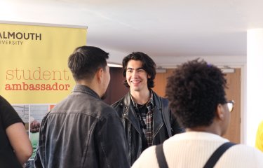 International students chatting at a table