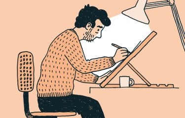 An illustration of a man sat at a desk drawing