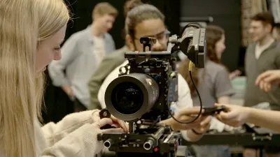 People using an ARRI camera as part of a demonstration