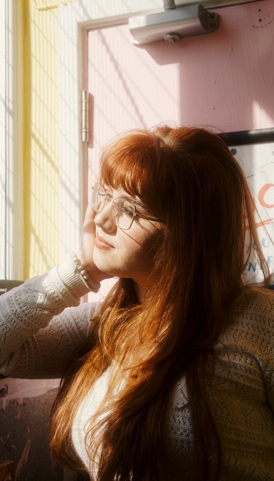 A girl looking out of a window