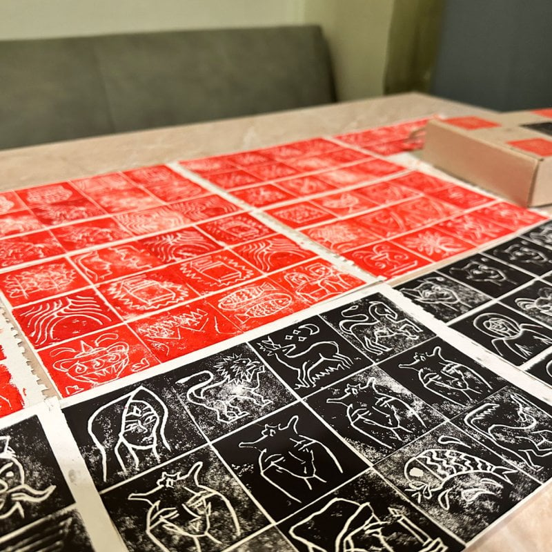 Lino prints in red and black