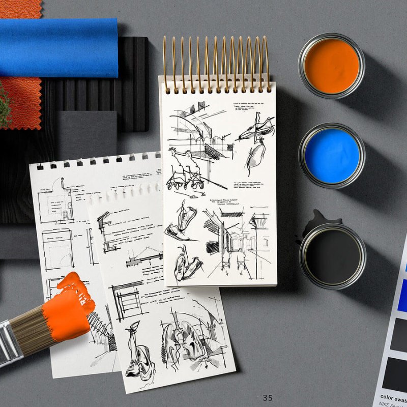 Sketches and black, orange and blue paint from Falmouth University Interior Design student