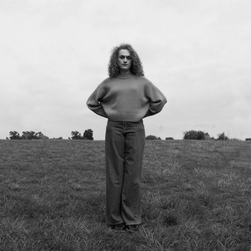 A girl stood in a field 