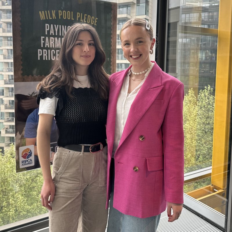 Two women stood together smiling