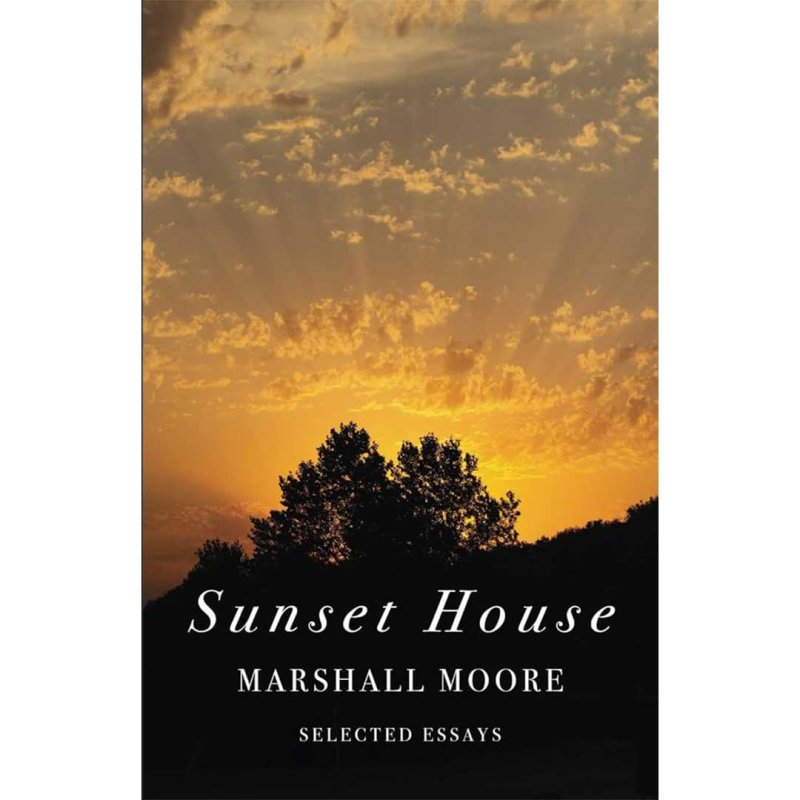 A book cover with a sunset