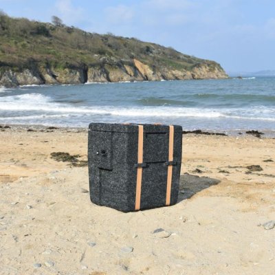 WoolBox Cooler (designed by Falmouth University graduate) on a beach